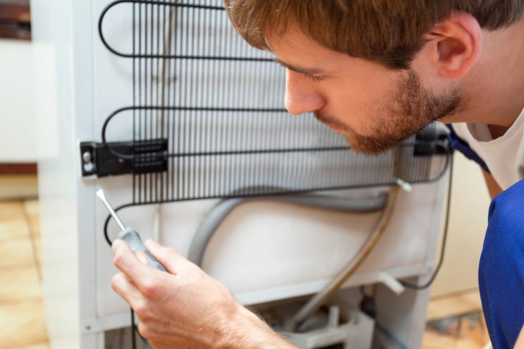 An image of a professional who does stove repairs in Jericho, NY